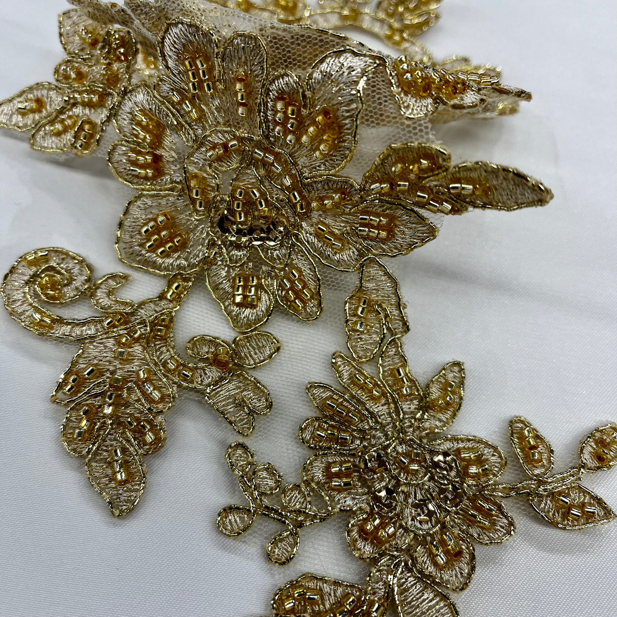 Beaded Corded Floral Lace Applique on Polyester Net Mesh