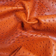 Orange Mutant Ostrich Gator Embossed Vinyl Fabric,
