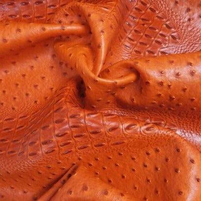 Orange Mutant Ostrich Gator Embossed Vinyl Fabric,