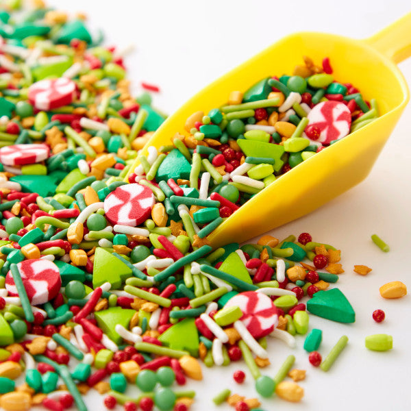 Wilton Christmas Sprinkles Mix, 5.57 oz. jimmies, sugar pearls, lightbulb shaped sprinkles, peppermint swirl shaped sprinkles and tree-shaped sprinkles