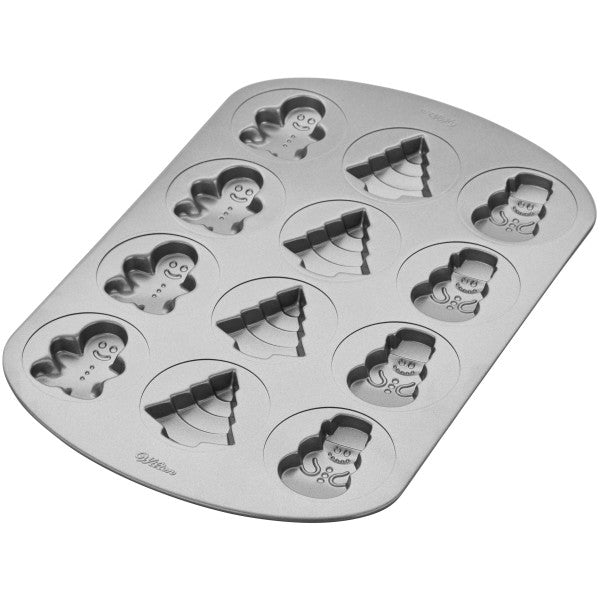 Wilton Non-Stick Christmas Cookie Shapes Pan, 12-Cavity (Gingerbread Man, Tree, Snowman)