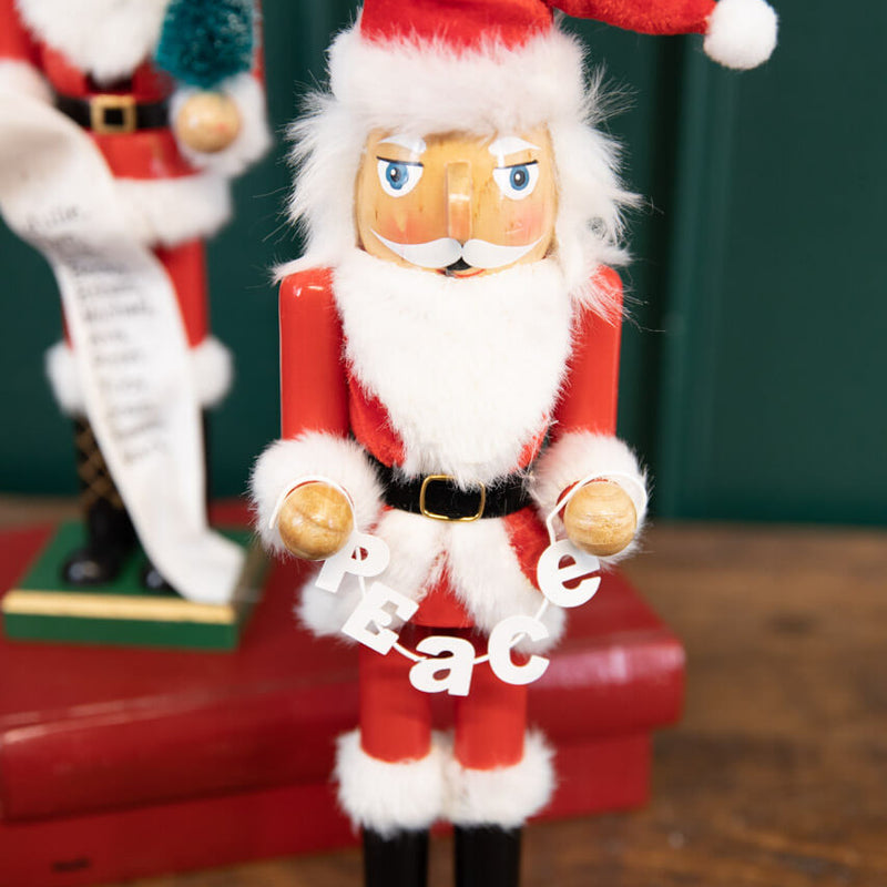 15" Santa Nutcracker with Peace Garland