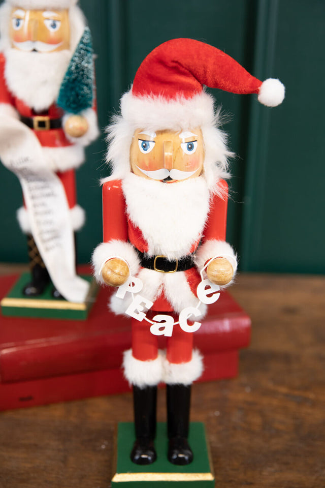 15" Santa Nutcracker with Peace Garland