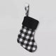 17 Inch Black And White Checkered Christmas Stocking Plush Fur Top Holiday Decoration