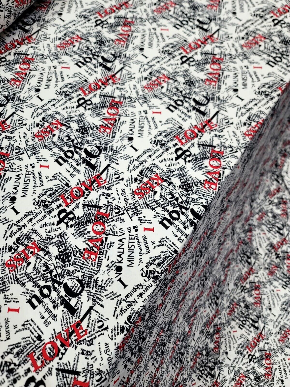 Rayon Jersey Spandex Knit Fabric - Newspaper Love Kiss Print