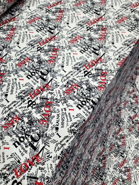 Rayon Jersey Spandex Knit Fabric - Newspaper Love Kiss Print