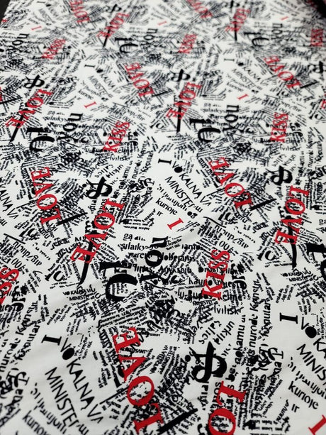 Rayon Jersey Spandex Knit Fabric - Newspaper Love Kiss Print