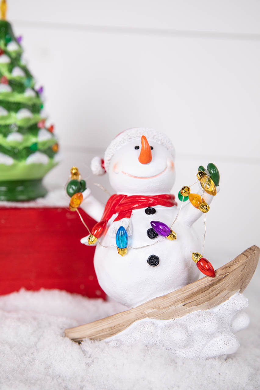 7.4” B/O Lighted Resin Skiing Snowman with Light String