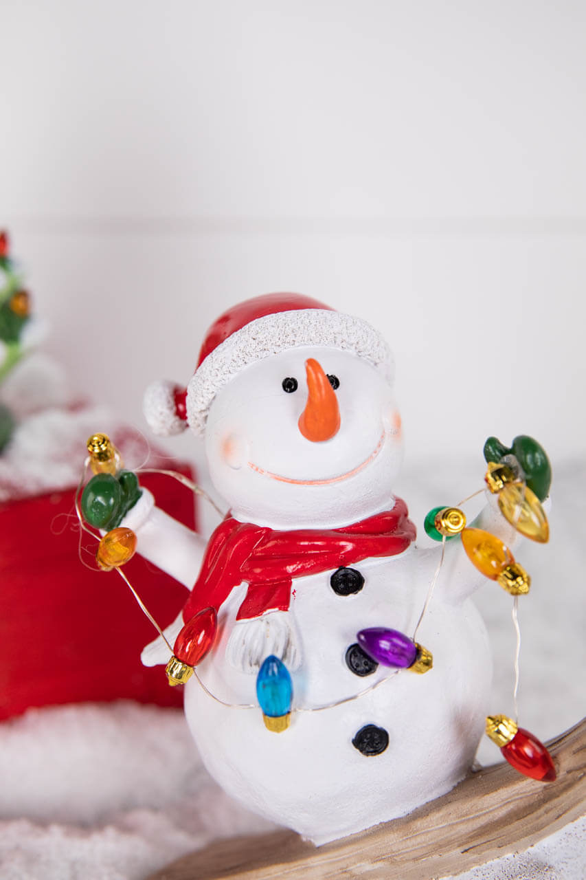 7.4” B/O Lighted Resin Skiing Snowman with Light String