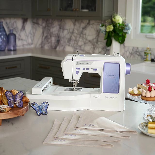 Husqvarna Viking Designer Quartz 29 Sewing Embroidery Machine - 250 Stitches, 180 Embroidery Designs, 7" Color Touch Screen (1 Unit)