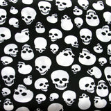 Nylon Lycra Swim Fabric White Skulls on Black